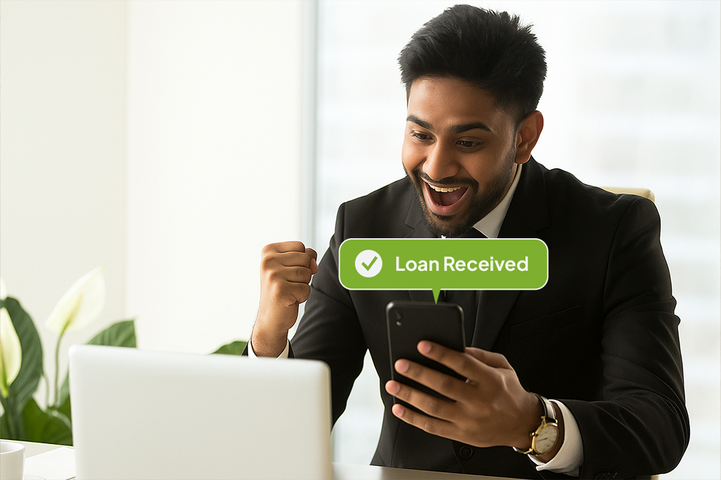 Happy man receiving instant personal loan approval on FatakPay app for salaried professionals.