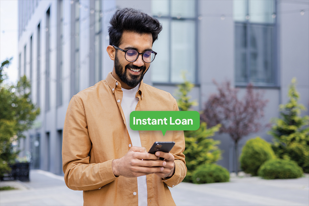 Man using phone to get an instant loan for small everyday purchases with quick approval on FatakPay.
